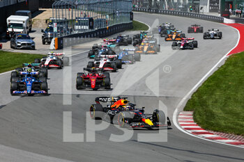 2022-06-19 - Start of the race: 01 VERSTAPPEN Max (nld), Red Bull Racing RB18, 14 ALONSO Fernando (spa), Alpine F1 Team A522, 55 SAINZ Carlos (spa), Scuderia Ferrari F1-75, 44 HAMILTON Lewis (gbr), Mercedes AMG F1 Team W13, action during the Formula 1 AWS Grand Prix du Canada 2022, 9th round of the 2022 FIA Formula One World Championship, on the Circuit Gilles Villeneuve, from June 17 to 19, 2022 in Montreal, Canada - F1 - CANADIAN GRAND PRIX 2022 - RACE - FORMULA 1 - MOTORS