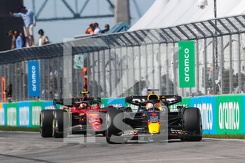 2022-06-19 - 01 VERSTAPPEN Max (nld), Red Bull Racing RB18, action 55 SAINZ Carlos (spa), Scuderia Ferrari F1-75, action during the Formula 1 AWS Grand Prix du Canada 2022, 9th round of the 2022 FIA Formula One World Championship, on the Circuit Gilles Villeneuve, from June 17 to 19, 2022 in Montreal, Canada - F1 - CANADIAN GRAND PRIX 2022 - RACE - FORMULA 1 - MOTORS