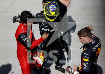 2022-06-19 - SAINZ Carlos (spa), Scuderia Ferrari F1-75, HAMILTON Lewis (gbr), Mercedes AMG F1 Team W13, VERSTAPPEN Max (ned), Red Bull Racing RB18, portrait during the Formula 1 AWS Grand Prix du Canada 2022, 9th round of the 2022 FIA Formula One World Championship, on the Circuit Gilles Villeneuve, from June 17 to 19, 2022 in Montreal, Canada - F1 - CANADIAN GRAND PRIX 2022 - RACE - FORMULA 1 - MOTORS