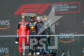 2022-06-19 - Podium: VERSTAPPEN Max (ned), Red Bull Racing RB18, SAINZ Carlos (spa), Scuderia Ferrari F1-75, HAMILTON Lewis (gbr), Mercedes AMG F1 Team W13, portrait during the Formula 1 AWS Grand Prix du Canada 2022, 9th round of the 2022 FIA Formula One World Championship, on the Circuit Gilles Villeneuve, from June 17 to 19, 2022 in Montreal, Canada - F1 - CANADIAN GRAND PRIX 2022 - RACE - FORMULA 1 - MOTORS