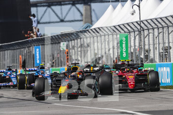 2022-06-19 - start of the race, depart, 01 VERSTAPPEN Max (nld), Red Bull Racing RB18, action 55 SAINZ Carlos (spa), Scuderia Ferrari F1-75, action during the Formula 1 AWS Grand Prix du Canada 2022, 9th round of the 2022 FIA Formula One World Championship, on the Circuit Gilles Villeneuve, from June 17 to 19, 2022 in Montreal, Canada - F1 - CANADIAN GRAND PRIX 2022 - RACE - FORMULA 1 - MOTORS