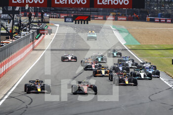 2022-07-03 - 2nd start race 55 SAINZ Carlos (spa), Scuderia Ferrari F1-75, action 01 VERSTAPPEN Max (nld), Red Bull Racing RB18, action 11 PEREZ Sergio (mex), Red Bull Racing RB18, action during the Formula 1 Lenovo British Grand Prix 2022, 10th round of the 2022 FIA Formula One World Championship, on the Silverstone Circuit, from July 1 to 3, 2022 in Silverstone, United Kingdom - F1 - BRITISH GRAND PRIX 2022 - RACE - FORMULA 1 - MOTORS