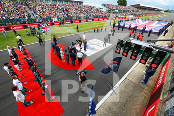 2022-06-30 - The National Anthem on the starting grid, during the Formula 1 Lenovo British Grand Prix 2022, 10th round of the 2022 FIA Formula One World Championship, on the Silverstone Circuit, from July 1 to 3, 2022 in Silverstone, United Kingdom - F1 - BRITISH GRAND PRIX 2022 - RACE - FORMULA 1 - MOTORS