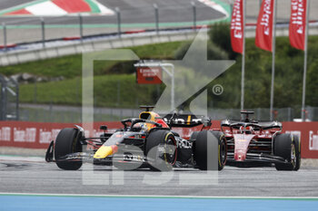 2022-07-10 - 01 VERSTAPPEN Max (nld), Red Bull Racing RB18, action 16 LECLERC Charles (mco), Scuderia Ferrari F1-75, action during the Formula 1 Rolex Grosser Preis Von Osterreich 2022, 2022 Austrian Grand Prix, 11th round of the 2022 FIA Formula One World Championship from July 8 to 10, 2022 on the Red Bull Ring, in Spielberg, Austria - F1 - AUSTRIAN GRAND PRIX 2022 - RACE - FORMULA 1 - MOTORS