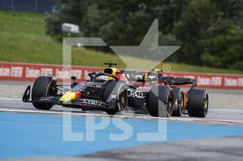 2022-07-10 - 01 VERSTAPPEN Max (nld), Red Bull Racing RB18, action 16 LECLERC Charles (mco), Scuderia Ferrari F1-75, action during the Formula 1 Rolex Grosser Preis Von Osterreich 2022, 2022 Austrian Grand Prix, 11th round of the 2022 FIA Formula One World Championship from July 8 to 10, 2022 on the Red Bull Ring, in Spielberg, Austria - F1 - AUSTRIAN GRAND PRIX 2022 - RACE - FORMULA 1 - MOTORS