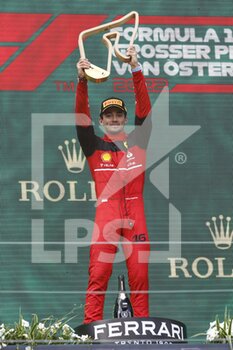 2022-07-10 - LECLERC Charles (mco), Scuderia Ferrari F1-75, portrait celebration victory podium during the Formula 1 Rolex Grosser Preis Von Osterreich 2022, 2022 Austrian Grand Prix, 11th round of the 2022 FIA Formula One World Championship from July 8 to 10, 2022 on the Red Bull Ring, in Spielberg, Austria - F1 - AUSTRIAN GRAND PRIX 2022 - RACE - FORMULA 1 - MOTORS