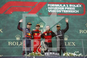 2022-07-10 - LECLERC Charles (mco), Scuderia Ferrari F1-75, portrait celebration victory podium VERSTAPPEN Max (ned), Red Bull Racing RB18, portrait HAMILTON Lewis (gbr), Mercedes AMG F1 Team W13, portrait during the Formula 1 Rolex Grosser Preis Von Osterreich 2022, 2022 Austrian Grand Prix, 11th round of the 2022 FIA Formula One World Championship from July 8 to 10, 2022 on the Red Bull Ring, in Spielberg, Austria - F1 - AUSTRIAN GRAND PRIX 2022 - RACE - FORMULA 1 - MOTORS