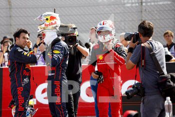 2022-07-23 - LECLERC Charles (mco), Scuderia Ferrari F1-75, portrait with VERSTAPPEN Max (ned), Red Bull Racing RB18 and PEREZ Sergio (mex), Red Bull Racing RB18 during the Formula 1 Lenovo Grand Prix de France, French Grand Prix 2022, 12th round of the 2022 FIA Formula One World Championship from July 22 to 24, 2022 on the Circuit Paul Ricard, in Le Castellet, France - F1 - FRENCH GRAND PRIX 2022 - FORMULA 1 - MOTORS