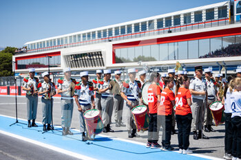 2022-07-24 - National Anthem on the starting grid, grille de depart, during the Formula 1 Lenovo Grand Prix de France, French Grand Prix 2022, 12th round of the 2022 FIA Formula One World Championship from July 22 to 24, 2022 on the Circuit Paul Ricard, in Le Castellet, France - F1 - FRENCH GRAND PRIX 2022 - RACE - FORMULA 1 - MOTORS