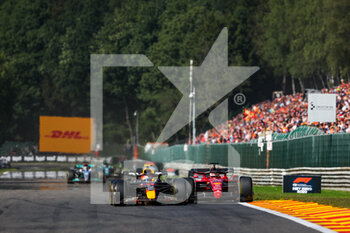 2022-08-28 - 11 PEREZ Sergio (mex), Red Bull Racing RB18, 16 LECLERC Charles (mco), Scuderia Ferrari F1-75, action during the Formula 1 Rolex Belgian Grand Prix 2022, 14th round of the 2022 FIA Formula One World Championship from August 26 to 28, 2022 on the Circuit de Spa-Francorchamps, in Francorchamps, Belgium - F1 - BELGIAN GRAND PRIX 2022 - RACE - FORMULA 1 - MOTORS