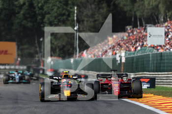 2022-08-28 - 11 PEREZ Sergio (mex), Red Bull Racing RB18, action 16 LECLERC Charles (mco), Scuderia Ferrari F1-75, action during the Formula 1 Rolex Belgian Grand Prix 2022, 14th round of the 2022 FIA Formula One World Championship from August 26 to 28, 2022 on the Circuit de Spa-Francorchamps, in Francorchamps, Belgium - F1 - BELGIAN GRAND PRIX 2022 - RACE - FORMULA 1 - MOTORS