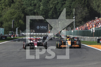 2022-08-28 - 24 ZHOU Guanyu (chi), Alfa Romeo F1 Team ORLEN C42, action 04 NORRIS Lando (gbr), McLaren F1 Team MCL36, action during the Formula 1 Rolex Belgian Grand Prix 2022, 14th round of the 2022 FIA Formula One World Championship from August 26 to 28, 2022 on the Circuit de Spa-Francorchamps, in Francorchamps, Belgium - F1 - BELGIAN GRAND PRIX 2022 - RACE - FORMULA 1 - MOTORS