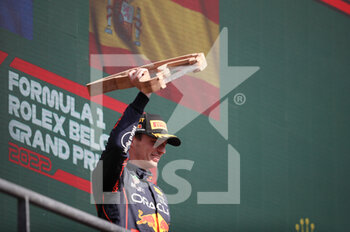 2022-08-28 - VERSTAPPEN Max (ned), Red Bull Racing RB18, portrait celebrates his victory on podium during the Formula 1 Rolex Belgian Grand Prix 2022, 14th round of the 2022 FIA Formula One World Championship from August 26 to 28, 2022 on the Circuit de Spa-Francorchamps, in Francorchamps, Belgium - F1 - BELGIAN GRAND PRIX 2022 - RACE - FORMULA 1 - MOTORS