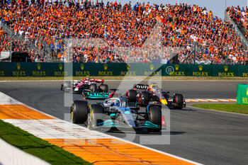 2022-09-03 - 63 RUSSELL George (gbr), Mercedes AMG F1 Team W13, 01 VERSTAPPEN Max (nld), Red Bull Racing RB18, 24 ZHOU Guanyu (chi), Alfa Romeo F1 Team ORLEN C42, action during the Formula 1 Heineken Dutch Grand Prix 2022, 15th round of the 2022 FIA Formula One World Championship from September 2 to 4, 2022 on the Zandvoort Circuit, in Netherlands, Belgium - F1 - DUTCH GRAND PRIX 2022 - FORMULA 1 - MOTORS