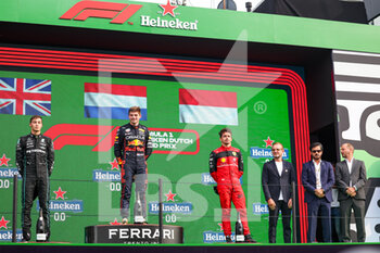 2022-09-04 - Podium: VERSTAPPEN Max (ned), Red Bull Racing RB18, RUSSELL George (gbr), Mercedes AMG F1 Team W13, LECLERC Charles (mco), Scuderia Ferrari F1-75, BEN SULAYEM Mohammed (uae), President of the FIA, portrait during the Formula 1 Heineken Dutch Grand Prix 2022, 15th round of the 2022 FIA Formula One World Championship from September 2 to 4, 2022 on the Zandvoort Circuit, in Netherlands, Belgium - F1 - DUTCH GRAND PRIX 2022 - RACE - FORMULA 1 - MOTORS