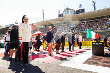 11/09/2022 - national anthem on the starting grid, grille de depart, Sergio Mattarella, Italian President, DOMENICALI Stefano (ita), Chairman and CEO Formula One Group FOG, BEN SULAYEM Mohammed (uae), President of the FIA, portrait on the starting grid, grille de depart, during the minute of silence in memory of Her Majesty Queen Elizabeth II, during the Formula 1 Pirelli Gran Premio d’Italia 2022, Italian Grand Prix 2022, 16th round of the 2022 FIA Formula One World Championship from September 9 to 11, 2022 on the Autodromo Nazionale di Monza, in Monza, Italy - F1 - ITALIAN GRAND PRIX 2022 - RACE - FORMULA 1 - MOTORI
