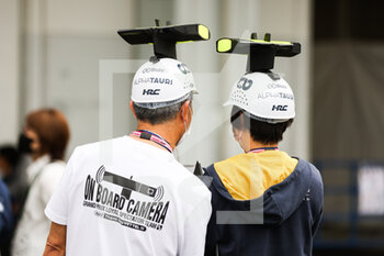 06/10/2022 - spectators, fans of Scuderia AlphaTauri, with a fake F1 onboard camera on the head during the Formula 1 Honda Japanese Grand Prix 2022, 18th round of the 2022 FIA Formula One World Championship from October 7 to 9, 2022 on the Suzuka International Racing Course, in Suzuka, Mie Prefecture, Japan - F1 - JAPANESE GRAND PRIX 2022 - FORMULA 1 - MOTORI