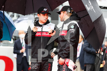 2022-10-09 - ZHOU Guanyu (chi), Alfa Romeo F1 Team ORLEN C42, BOTTAS Valtteri (fin), Alfa Romeo F1 Team ORLEN C42, portrait starting grid, grille de depart, during the Formula 1 Honda Japanese Grand Prix 2022, 18th round of the 2022 FIA Formula One World Championship from October 7 to 9, 2022 on the Suzuka International Racing Course, in Suzuka, Mie Prefecture, Japan - F1 - JAPANESE GRAND PRIX 2022 - RACE - FORMULA 1 - MOTORS