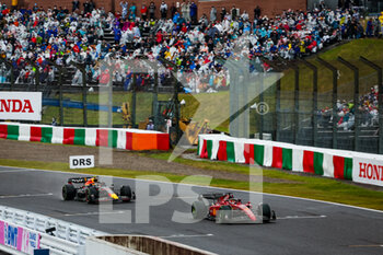 2022-10-09 - 16 LECLERC Charles (mco), Scuderia Ferrari F1-75, 11 PEREZ Sergio (mex), Red Bull Racing RB18, action during the Formula 1 Honda Japanese Grand Prix 2022, 18th round of the 2022 FIA Formula One World Championship from Octobre 7 to 9, 2022 on the Suzuka International Racing Course, in Suzuka, Mie Prefecture, Japan - F1 - JAPANESE GRAND PRIX 2022 - RACE - FORMULA 1 - MOTORS