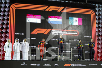 2022-11-20 - Podium, BEN SULAYEM Mohammed (uae), President of the FIA, LECLERC Charles (mco), Scuderia Ferrari F1-75, VERSTAPPEN Max (ned), Red Bull Racing RB18, PEREZ Sergio (mex), Red Bull Racing RB18, portrait on the podium during the Formula 1 Etihad Airways Abu Dhabi Grand Prix 2022, 22nd round of the 2022 FIA Formula One World Championship from November 18 to 20, 2022 on the Yas Marina Circuit, in Yas Island, Abu Dhabi - F1 - ABU DHABI GRAND PRIX 2022 - RACE - FORMULA 1 - MOTORS