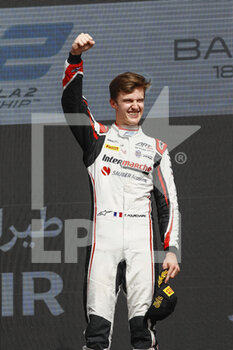 2022-03-20 - Pourchaire Théo (fra), ART Grand Prix, Dallara F2, portrait celebrating his victory podium during the 1st round of the 2022 FIA Formula 2 Championship from March 18 to 20, 2022 on the Bahrain International Circuit, in Sakhir, Bahrain - 1ST ROUND OF THE 2022 FIA FORMULA 2 CHAMPIONSHIP - FORMULA 2 - MOTORS