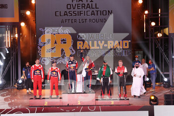 2022-01-14 - 211 Loeb Sébastien (fra), Lurquin Fabian (bel), Bahrain Raid Xtreme, BRX Prodrive Hunter T1+, Auto FIA T1/T2, W2RC, 2nd place, 201 Al-Attiyah Nasser (qat), Baumel Batthieu (fra), Toyota Gazoo Racing, Toyota GR DKR Hilux T1+, Auto FIA T1/T2, W2RC, 1st place, 205 Al Rajhi Yazeed (sau), Orr Michael (gbr), Overdrive Toyota, Toyota Hilux Overdrive, Auto FIA T1/T2, W2RC, 3rd place during the Podium Finish of the Dakar Rally 2022, on January 14th 2022 in Jeddah, Saudi Arabia - PODIUM FINISH - STAGE 12 OF THE DAKAR RALLY 2022 BETWEEN BISHA AND JEDDAH - RALLY - MOTORS