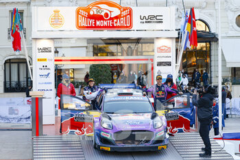 2022-01-23 - 19 Sébastien LOEB (FRA), Isabelle GALMICHE (FRA), M-SPORT FORD WORLD RALLY TEAM FORD, Puma Rally1, podium during the 2022 WRC World Rally Car Championship, 90th edition of the Monte Carlo rally from January 20 to 23, 2022 at Monaco - 2022 WRC WORLD RALLY CAR CHAMPIONSHIP, 90TH EDITION OF THE MONTE CARLO RALLY - RALLY - MOTORS