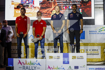 2022-10-23 - 201 LOEB Sébastien (fra), LURQUIN Fabian (bel), Bahrain Raid Xtreme, Prodrive Hunter, FIA W2RC, Auto, 200 AL-ATTIYAH Nasser (qat), BAUMEL Mathieu (fra), Toyota Gazoo Racing, Toyota GR DKR Hilux, FIA W2RC, Auto, portrait during the Official Award Giving Ceremony of the Andalucia Rally 2022, 4th round of the 2022 FIA World Rally-Raid Championship, on October 23, 2022 in Sevilla, Spain - AUTO - ANDALUCIA RALLY 2022 - RALLY - MOTORS