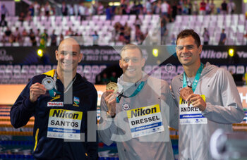 2022-06-19 - Nicholas Santos of Brazil Silver medal, Caeleb Dressel of USA Gold medal, Michael Andrew of USA Bronze medal, Men 50 M Butterfly during the 19th FINA World Championships Budapest 2022, Swimming event on June 19, 2022 in Budapest, Hungary - SWIMMING - FINA WORLD CHAMPIONSHIPS BUDAPEST 2022 - SWIMMING - SWIMMING