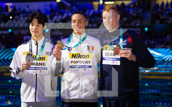 2022-06-20 - Sunwoo Hwang of Republic of Korea Silver medal, David Popovici of Romania Gold medal, Tom Dean of Great Britain Bronze medal, Men 200 M Freestyle during the 20 Th FINA World Championships Budapest 2022, Swimming event on June 20, 2022 in Budapest, Hungary - SWIMMING - FINA WORLD CHAMPIONSHIPS BUDAPEST 2022 - SWIMMING - SWIMMING