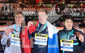 2022-06-22 - Carson Foster of USA Silver medal, Leon Marchand of France Gold medal, Daiya Seto of Japan Bronze medal, 200 M Medley Men during the 19th FINA World Championships Budapest 2022, Swimming event on June 22 2022 in Budapest, Hungary - SWIMMING - FINA WORLD CHAMPIONSHIPS BUDAPEST 2022 - SWIMMING - SWIMMING