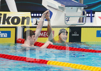 2022-06-25 - Hunter Armstrong of USA Silver medal, Justin Ress of USA Gold medal, Final 50 M Backstroke Men during the 19th FINA World Championships Budapest 2022, Swimming event on June 25 2022 in Budapest, Hungary - SWIMMING - FINA WORLD CHAMPIONSHIPS BUDAPEST 2022 - SWIMMING - SWIMMING