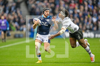 05/11/2022 - Fiji’s Vinaya Habosi tackles Scotland's Darcy Graham during the 2022 Autumn Nations Series, rugby union test match between Scotland and Fiji on November 5, 2022 at BT Murrayfield Stadium in Edinburgh, Scotland - RUGBY - TEST MATCH - SCOTLAND V FIJI - AUTUMN NATIONS SERIES - RUGBY