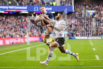 05/11/2022 - Fiji’s Vilimoni Botitu tackles Scotland's Darcy Graham during the 2022 Autumn Nations Series, rugby union test match between Scotland and Fiji on November 5, 2022 at BT Murrayfield Stadium in Edinburgh, Scotland - RUGBY - TEST MATCH - SCOTLAND V FIJI - AUTUMN NATIONS SERIES - RUGBY