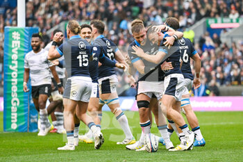 05/11/2022 - Scotland's Ben White celebrates with his team mates after he scores a try during the 2022 Autumn Nations Series, rugby union test match between Scotland and Fiji on November 5, 2022 at BT Murrayfield Stadium in Edinburgh, Scotland - RUGBY - TEST MATCH - SCOTLAND V FIJI - AUTUMN NATIONS SERIES - RUGBY