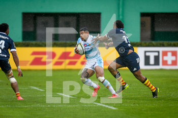 2022-04-09 - Monty Ioane (Treviso) tackled by Edward Sawaileau (Perpignan) - BENETTON RUGBY VS USA PERPIGNAN - CHALLENGE CUP - RUGBY