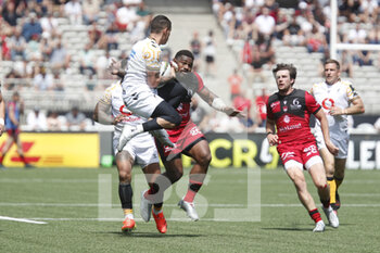 14/05/2022 - Jacob UMAGA of Wasps and Josua TUISOVA of Lyon and Pierre-Louis BARASSI of Lyon during the EPCR Challenge Cup, Semi Finals rugby union match between LOU Rugby (Lyon) and Wasps on May 14, 2022 at Matmut Stadium Gerland in Lyon, France - LOU RUGBY (LYON) AND WASPS - CHALLENGE CUP - RUGBY