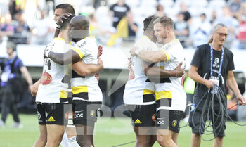 15/05/2022 - Raymond Rhule, Facundo Bosch of La Rochelle and teammates celebrate the victory during the European Rugby Champions Cup, Semi-finals rugby union match between Racing 92 and Stade Rochelais (La Rochelle) on May 15, 2022 at Stade Bollaert-Delelis in Lens, France - RACING 92 AND STADE ROCHELAIS (LA ROCHELLE) - HEINEKEN CHAMPIONS CUP - RUGBY