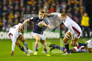 2022-02-05 - Scotland's Darcy Graham breaks through the England defence during the Six Nations 2022 rugby union match between Scotland and England on February 5, 2022 at BT Murrayfield in Edinburgh, Scotland - SIX NATIONS 2022 - SCOTLAND VS ENGLAND - SIX NATIONS - RUGBY