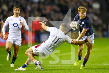 2022-02-05 - Scotland's Darcy Graham and England's Joe Merchant during the Six Nations 2022 rugby union match between Scotland and England on February 5, 2022 at BT Murrayfield in Edinburgh, Scotland - SIX NATIONS 2022 - SCOTLAND VS ENGLAND - SIX NATIONS - RUGBY