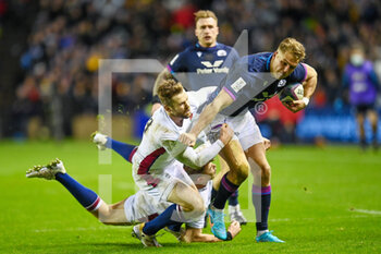 2022-02-05 - Scotland's Duhan ven der Merwe is tackled by England's Elliot Daly during the Six Nations 2022 rugby union match between Scotland and England on February 5, 2022 at BT Murrayfield in Edinburgh, Scotland - SIX NATIONS 2022 - SCOTLAND VS ENGLAND - SIX NATIONS - RUGBY