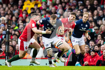 2022-02-12 - Matt Fagerson of Scotland under pressure from Wyn Jones of Wales during the Six Nations 2022, rugby union match between Wales and Scotland on February 12, 2022 at Principality Stadium in Cardiff, Wales - SIX NATIONS 2022 - WALES VS SCOTLAND - SIX NATIONS - RUGBY