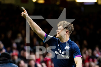 2022-02-12 - Darcy Graham of Scotland celebrates scoring his sides first try during the Six Nations 2022, rugby union match between Wales and Scotland on February 12, 2022 at Principality Stadium in Cardiff, Wales - SIX NATIONS 2022 - WALES VS SCOTLAND - SIX NATIONS - RUGBY