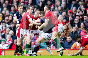 2022-02-12 - Stuart Hogg of Scotland under pressure from Dan Biggar of Wales during the Six Nations 2022, rugby union match between Wales and Scotland on February 12, 2022 at Principality Stadium in Cardiff, Wales - SIX NATIONS 2022 - WALES VS SCOTLAND - SIX NATIONS - RUGBY