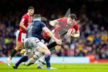 2022-02-12 - Taine Basham of Wales is tackled by Grant Gilchrist of Scotland during the Six Nations 2022, rugby union match between Wales and Scotland on February 12, 2022 at Principality Stadium in Cardiff, Wales - SIX NATIONS 2022 - WALES VS SCOTLAND - SIX NATIONS - RUGBY