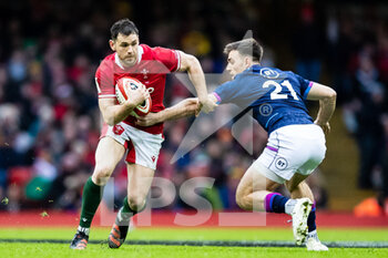 2022-02-12 - Tomos Williams of Wales under pressure from Ben White of Scotland during the Six Nations 2022, rugby union match between Wales and Scotland on February 12, 2022 at Principality Stadium in Cardiff, Wales - SIX NATIONS 2022 - WALES VS SCOTLAND - SIX NATIONS - RUGBY