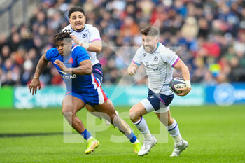 2022-02-26 - Scotland's Ali Price looks to break clear of France's Jonathan Danty during the Six Nations 2022, rugby union match between Scotland and France on February 26, 2022 at BT Murrayfield Stadium in Edinburgh, Scotland - SIX NATIONS 2022 - SCOTLAND VS FRANCE - SIX NATIONS - RUGBY