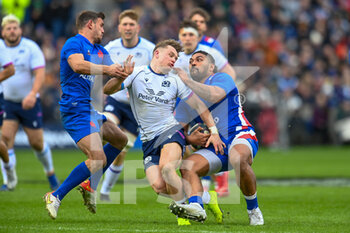 2022-02-26 - France's Peato Mauvaka snatches the ball from Scotland's Darcy Graham during the Six Nations 2022, rugby union match between Scotland and France on February 26, 2022 at BT Murrayfield Stadium in Edinburgh, Scotland - SIX NATIONS 2022 - SCOTLAND VS FRANCE - SIX NATIONS - RUGBY