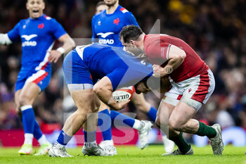 2022-03-11 - Julien Marchand of France under pressure from Ryan Elias of Wales during the Six Nations 2022 rugby union match between Wales and France on March 11, 2022 at Principality Stadium in Cardiff, Wales - SIX NATIONS 2022 - WALES VS FRANCE - SIX NATIONS - RUGBY