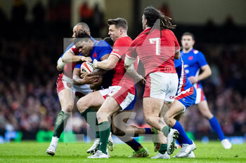 2022-03-11 - Jonathan Danty of France under pressure from Dan Biggar of Wales during the Six Nations 2022 rugby union match between Wales and France on March 11, 2022 at Principality Stadium in Cardiff, Wales - SIX NATIONS 2022 - WALES VS FRANCE - SIX NATIONS - RUGBY